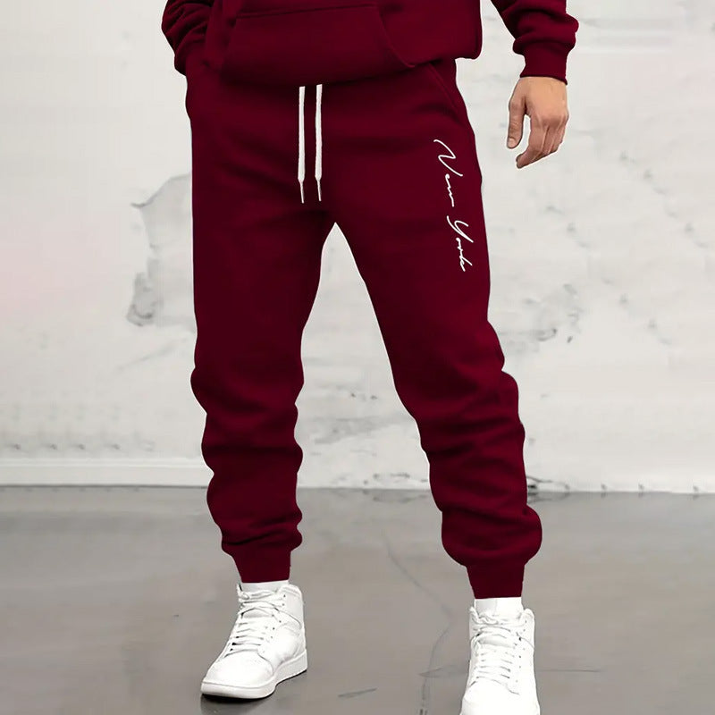 Mens Casual Tapered Sport Trousers with Letter Print Design in CK15-Black. Premium Polyester Fabric for Comfort & Style.