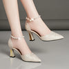 Chic faux pearl block heel pumps with ankle strap, pointed toe design, perfect for weddings and formal events.