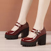 Women's chunky heel brogue platform shoes with heart straps, featuring vintage style and comfortable block heel design.