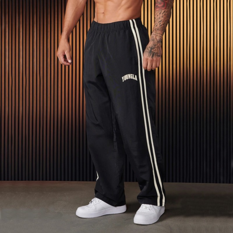Quick-Dry Athletic Pants for Men in Black. Moisture-wicking, loose fit trousers for gym and running. Sizes M-XXXL.