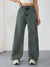 Flat lay of Sunset Boulevard wide-leg jeans with urban chic accessories.