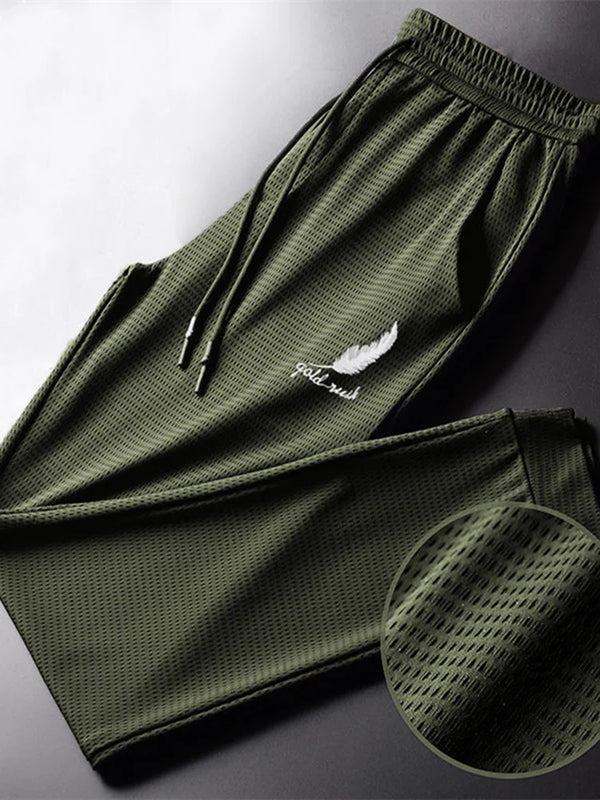 Lightweight quick-dry men's hiking pants with adjustable drawstring, breathable fabric, perfect for outdoor activities and wo