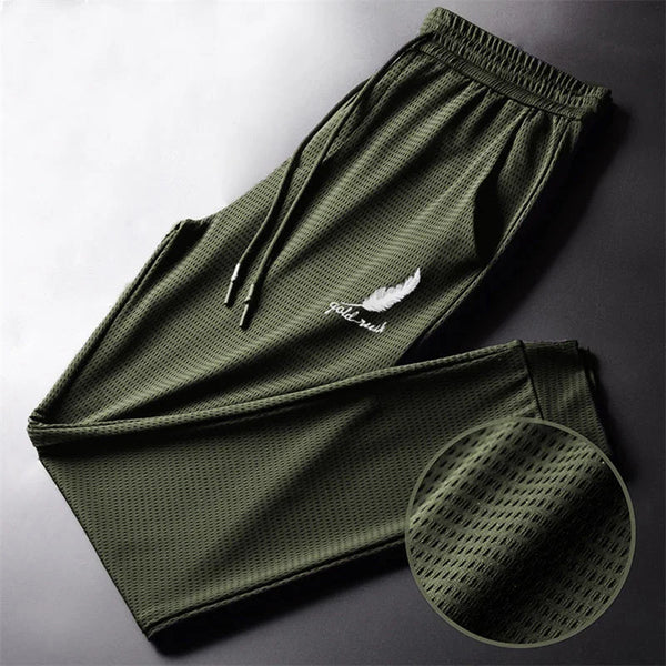 Lightweight quick-dry men's hiking pants with breathable fabric, adjustable drawstring, and ankle-tied design for outdoor act