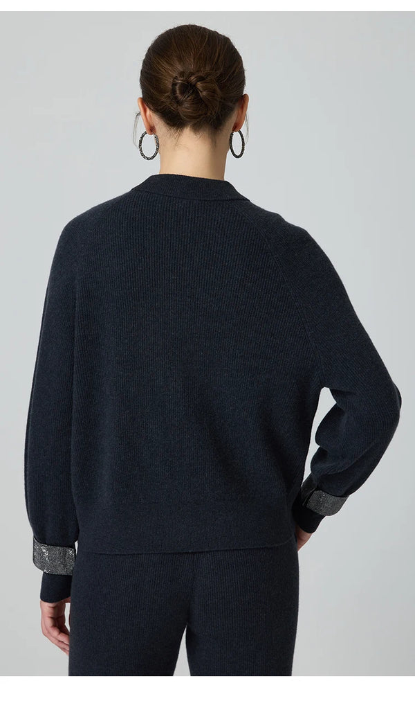 Classic button-front cardigan in 100% wool featuring relaxed silhouette and V-neck design