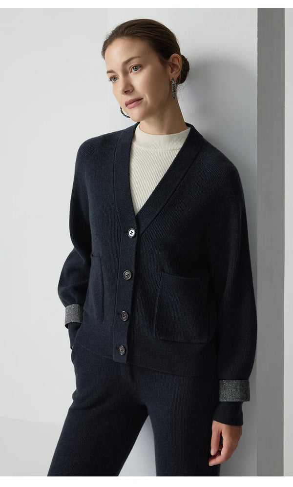 Elegant loose fit wool cardigan with expert ribbing and breathable heavyweight construction