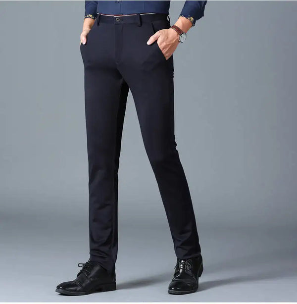 Elegant Men's Slim Fit Dress Pants in solid black, perfect for formal attire and everyday office wear, made from premium poly