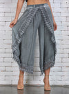 Chic summer harem pants with tassel detail, lightweight, relaxed fit, ankle-length, perfect for casual outings and beach days