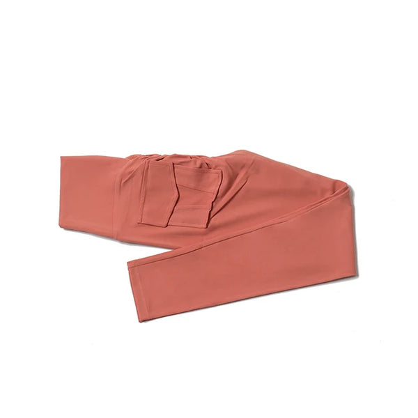 Purple high-waist yoga leggings with seamless pockets, stylish and functional.