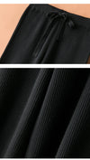 Luxe cashmere blend wide-leg pants for women, featuring a high waist, soft fabric, and comfortable elastic waistband.