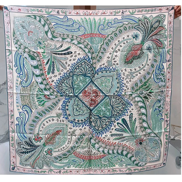 Model wearing the elegant silk paisley scarf as a stylish hijab.