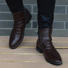 Top-down view of plush leather ankle boots featuring durable rubber soles for outdoor wear.