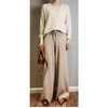 Luxe cashmere blend wide-leg pants for women, featuring a high-waist, soft fabric, and comfortable elastic waistband.