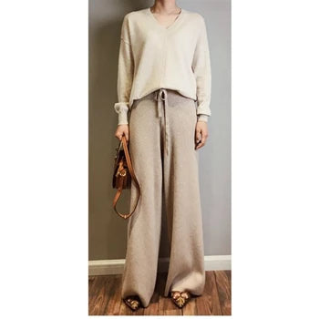 Luxe cashmere blend wide-leg pants for women, featuring a high-waist, soft fabric, and comfortable elastic waistband.