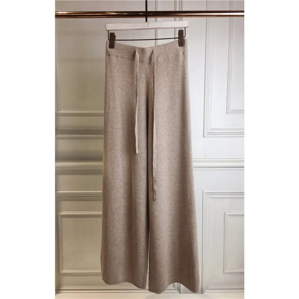 Luxe cashmere blend wide-leg pants for women, featuring a high-waist, soft fabric, and comfortable elastic waistband.