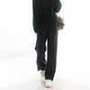Luxe cashmere blend wide-leg pants for women, featuring a high waist, soft fabric, and comfortable elastic waistband.
