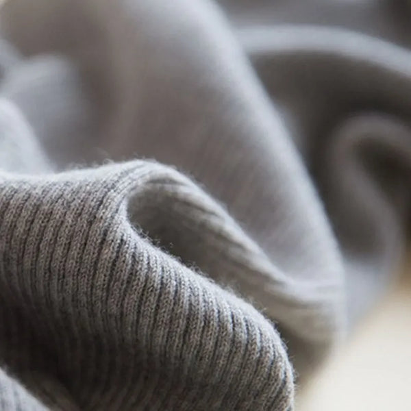 Luxe cashmere blend wide-leg pants for women, featuring a high waist, soft fabric, and comfortable elastic waistband.