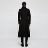 Back view of the long Gothic coat showcasing the big wave hem design.