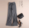 Luxe cashmere blend wide-leg pants for women, featuring a high waist, soft fabric, and comfortable elastic waistband.
