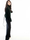 Luxe cashmere blend wide-leg pants for women, featuring a high-waist, soft fabric, and comfortable elastic waistband.