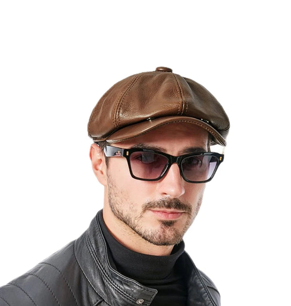 Brown cowhide beret highlighting its unique artisanal craftsmanship.