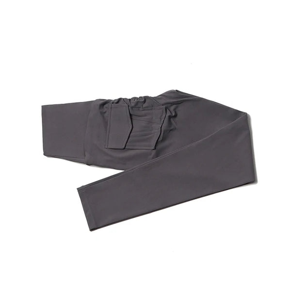 Black yoga pants with high waist and pockets, perfect for gym and casual wear.