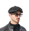Versatile black leather beret, suitable for both men and women.