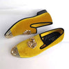 Stylish gold toe velvet loafers for men, perfect for formal wear.