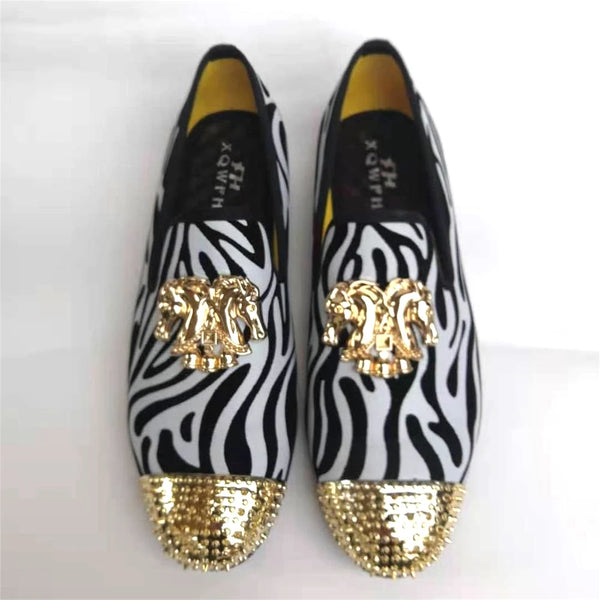 Elegant men's footwear in navy velvet with a luxurious gold toe.