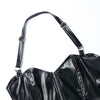 Chic cropped faux leather biker jacket for women with rivet detailing and slim fit, perfect for edgy streetwear style.