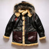 Close-up of the zipper detail on the luxury men's shearling leather bomber jacket.