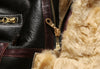 Close-up of the luxurious leather finish on the bomber jacket.