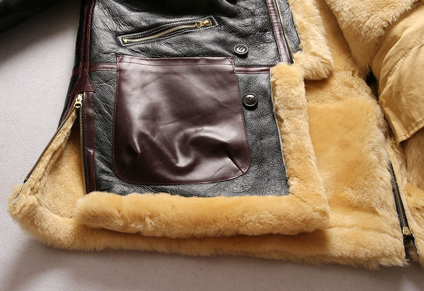 Luxury men's shearling leather bomber jacket in a stylish pose.