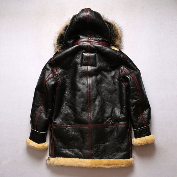 Luxury men's shearling leather bomber jacket draped over a chair.