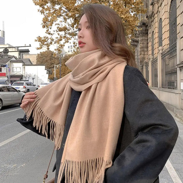 Cozy black winter scarf for women, ideal for casual and formal outfits.