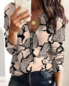 Chic digital print zipper blouse for women with geometric pattern, V-neck, and slight stretch for a stylish, comfortable fit.