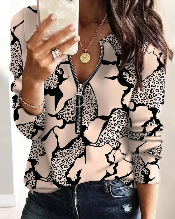 Chic digital print zipper blouse for women with geometric pattern, V-neck, and slight stretch for a stylish, comfortable fit.