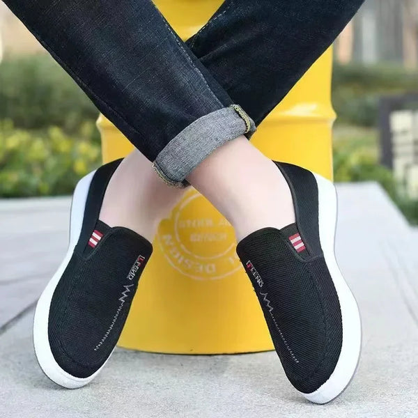 Men's casual footwear with moisture-wicking canvas and massage insole features