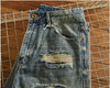 Rebel Spirit Distressed Jeans displayed with a casual jacket, ideal for timeless style.