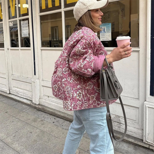 Cotton blend outerwear jacket featuring bold print and versatile button-front