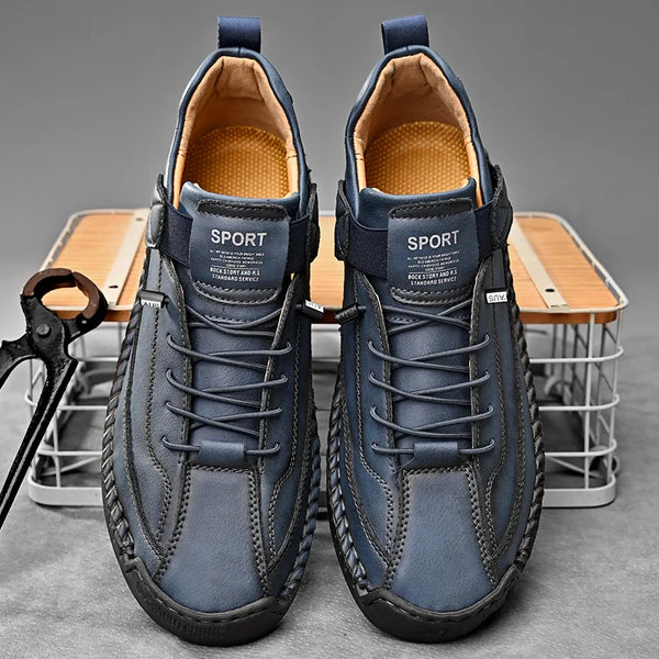 Close-up of handcrafted leather loafer showing detailed artisan stitching and supple genuine leather texture