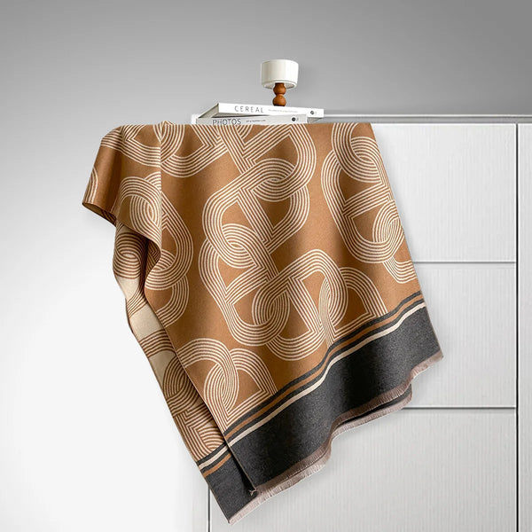 Stylish travel accessory, ideal for keeping warm during autumn trips.