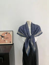 Lightweight vintage scarf, perfect for adding sophistication to any casual look.
