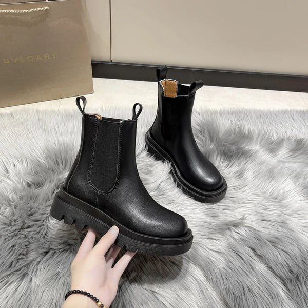 Chic Chelsea boots for women with thick sole, slip-on design, and durable rubber outsole, perfect for autumn and spring wear.