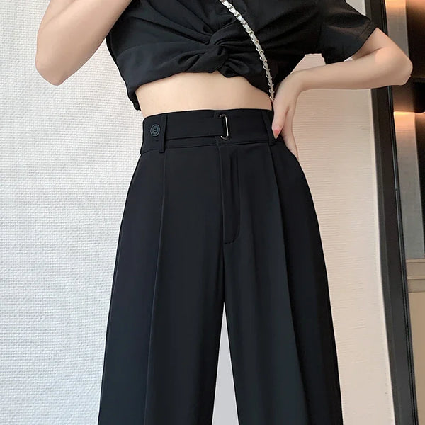 High-waisted polyester trousers with elongating wide leg style for sophisticated look