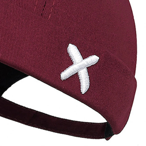 Vintage-style brimless cap showing comfortable snug fit construction