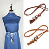 Bohemian braided faux leather skinny belt for women in camel, perfect for casual and formal outfits with fringe accents.