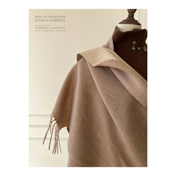 Stylish cashmere-feel scarf in soft gray, ideal for shopping trips and winter accessories.