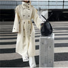 Long polyester trench coat in cream with flattering belted waist detail