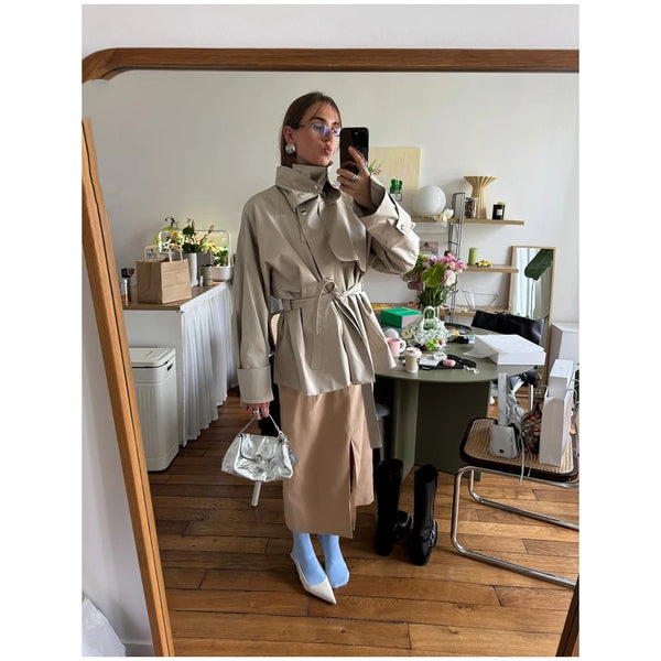 Polished khaki trench with stand collar perfect for fall and winter layering