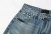 Trendy washed and ripped wide-leg women's jeans with distressed ink-splashed finish for a chic, casual look.